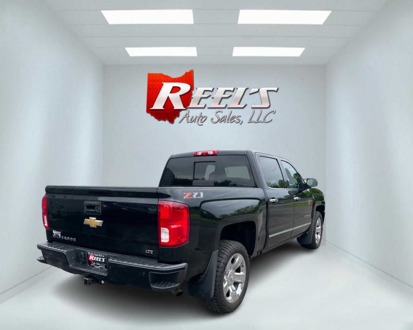 2018 Black /Black Chevrolet Silverado 1500 LTZ Z71 Crew Cab 4WD (3GCUKSEC4JG) with an 5.3L V8 OHV 16V engine, 8-Speed Automatic transmission, located at 547 E. Main St., Orwell, OH, 44076, (440) 437-5893, 41.535435, -80.847855 - This 2018 Chevrolet Silverado 1500 LTZ Z71 Crew Cab is a well-appointed and highly capable full-size pickup. It's powered by a 5.3L Vortec V8 engine paired with an 8-speed automatic transmission and 3.42 gearing, enabling an impressive 9,300-pound towing capacity. The Z71 off-road package includes f - Photo#6